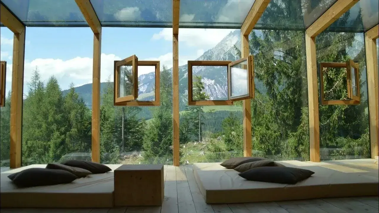 A calm and serene living room with a view of nature