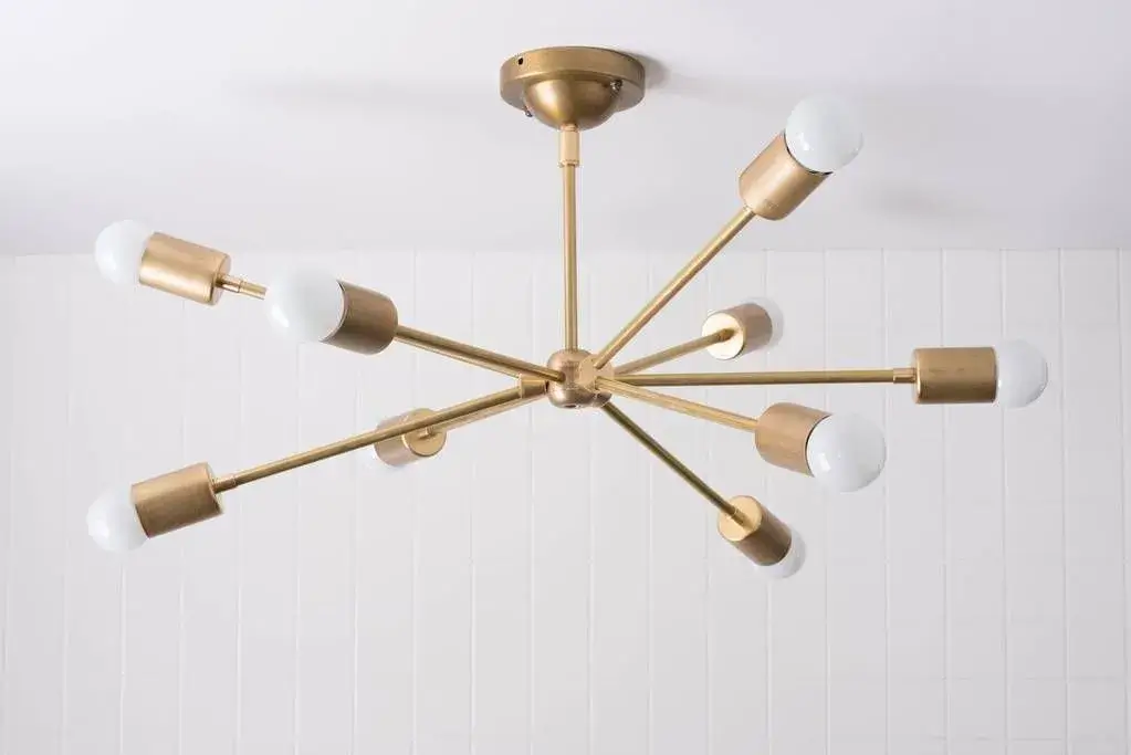 A custom marble and brass light fixture