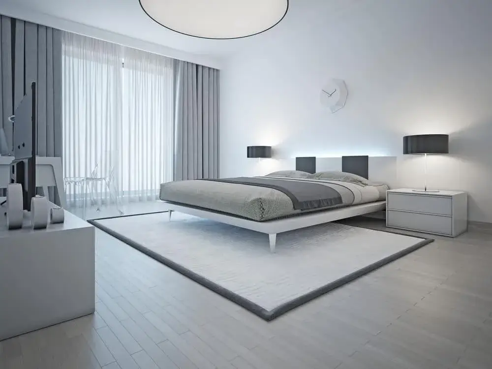 Minimalist bedroom with a focus on light and form
