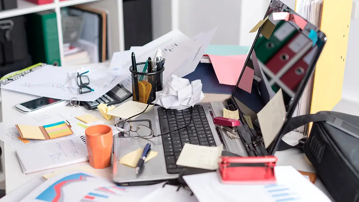An organized desk with documents and samples, symbolizing clarity
